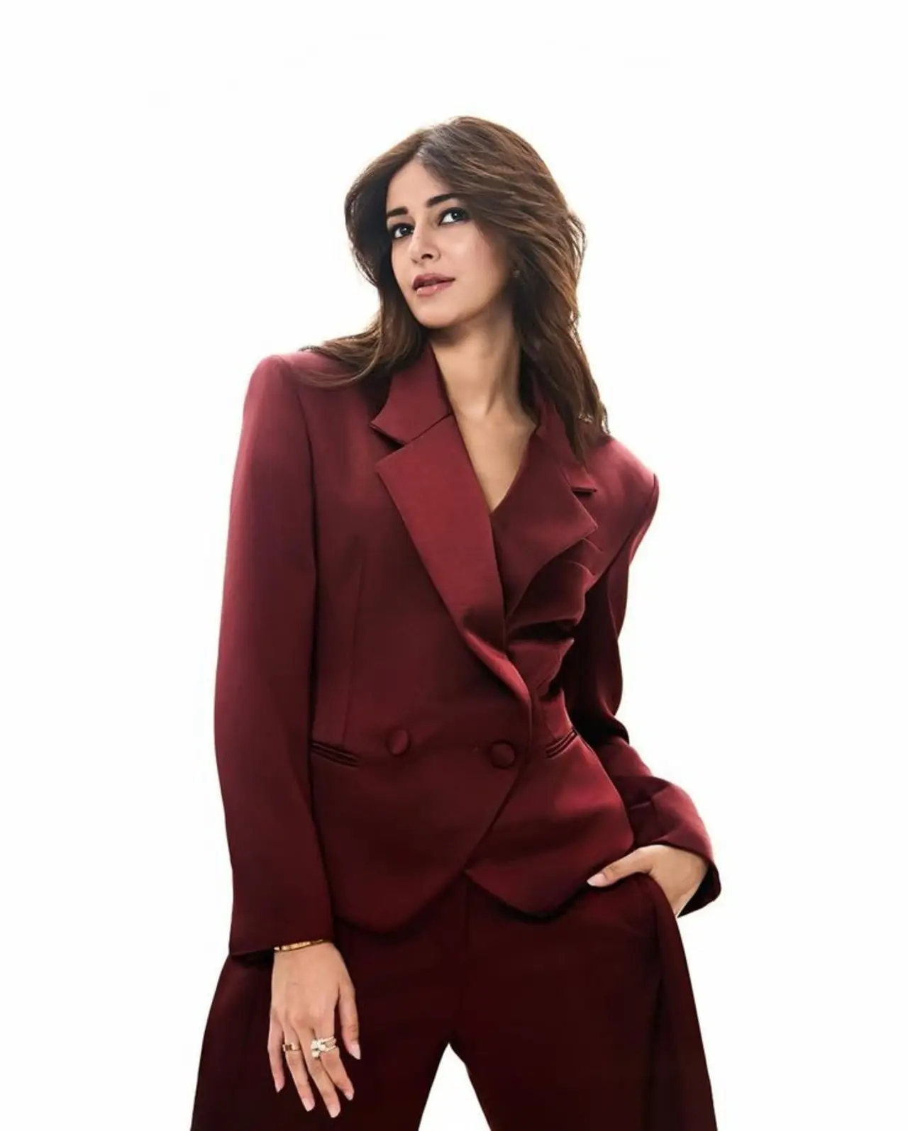 Ananya Panday elevates the traditional pantsuit game in a stunning wine-hued double-breasted ensemble that radiates sophistication.
